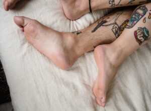 intertwined initial tattoos